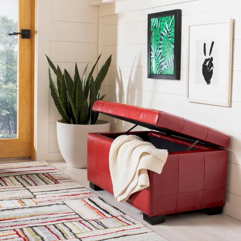 Banc de rangement en similicuir bicast matelassé rouge avec pieds en bois noir