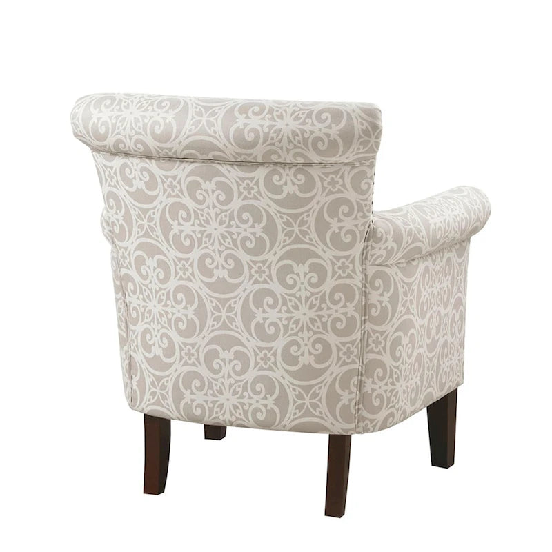 Fauteuil club capitonné avec motif de frettes et clous décoratifs argentés
