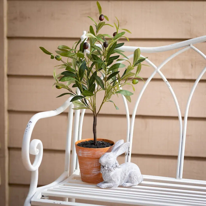 Banc de jardin en métal blanc avec dossier en arc et accoudoirs à volutes ornementales