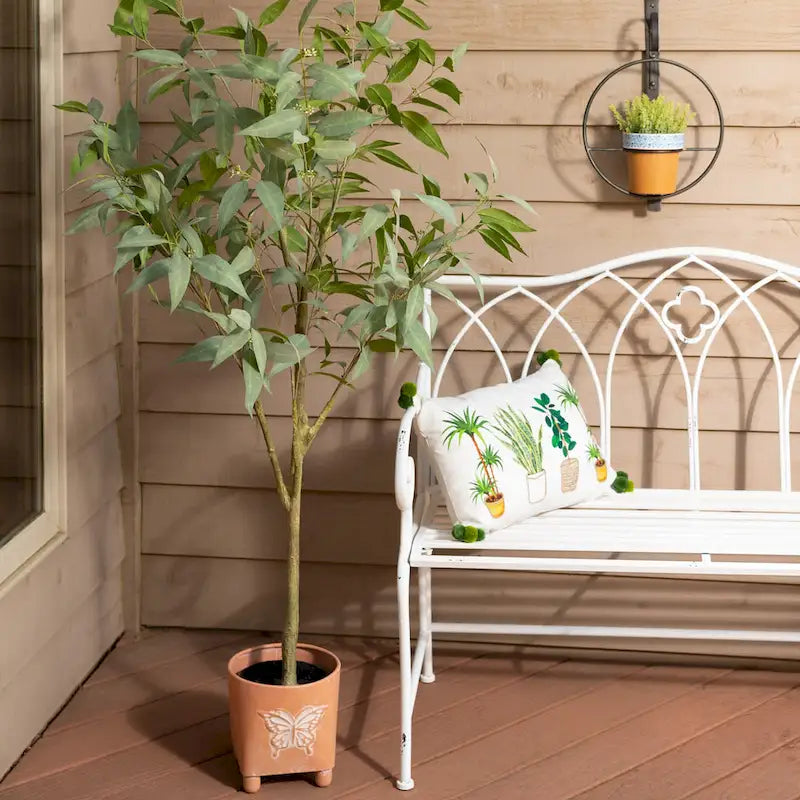 Banc de jardin en métal blanc avec dossier en arc et accoudoirs à volutes ornementales