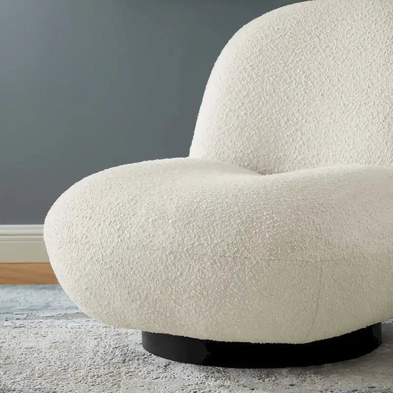 Fauteuil pivotant d'appoint en bouclé ivoire avec piètement en métal noir mat
