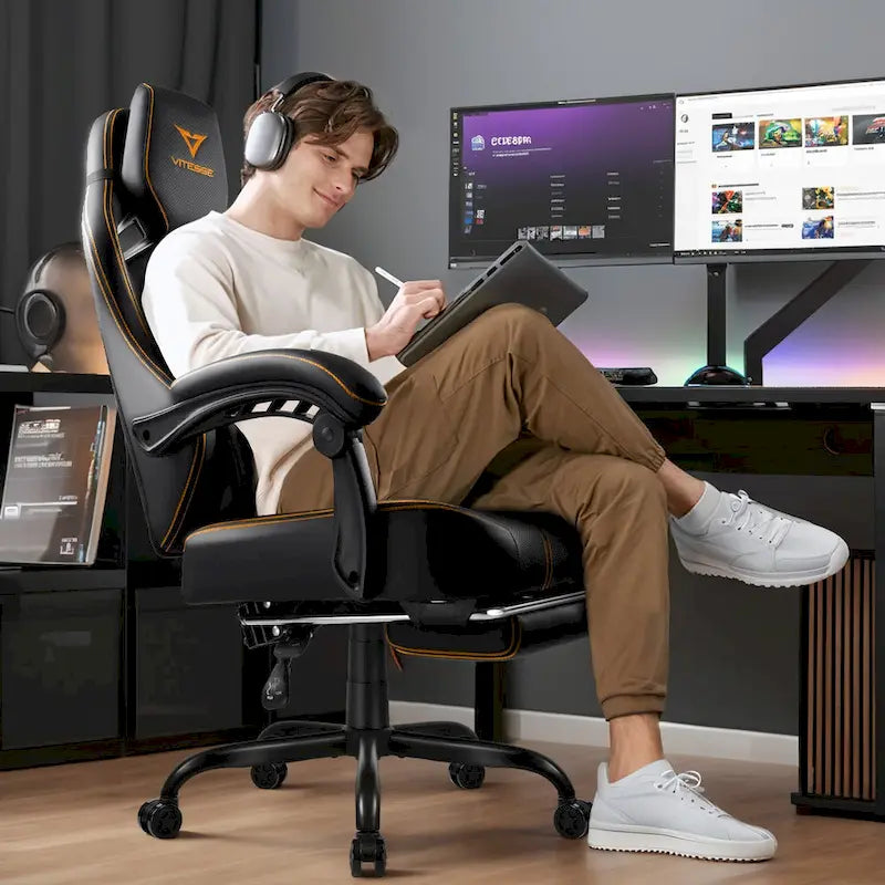 Grande et haute chaise de jeu ergonomique noire avec repose-pieds et soutien lombaire
