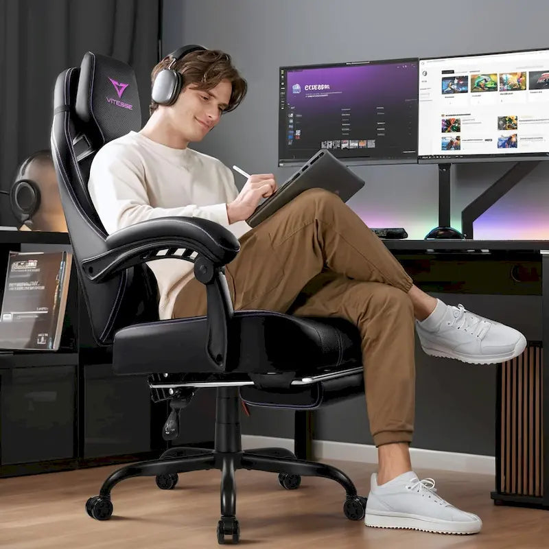 Grande et haute chaise de jeu ergonomique noire avec repose-pieds et soutien lombaire